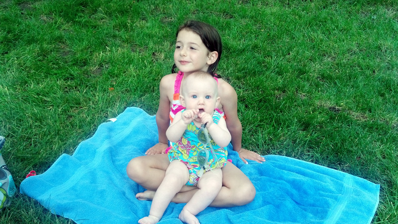 Lucia and Camille Enjoying a Pool Break
