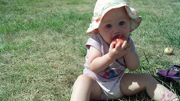 Lucia Enjoying an Apple