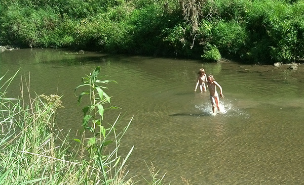 Mari and Hope Playing in the River