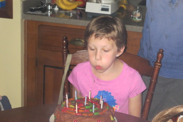 Mari Blowing Out Her Candles